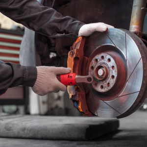 worker repairing car side view